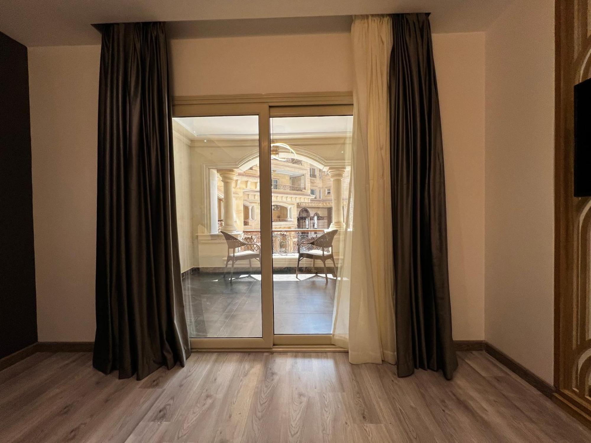 Onyx Pyramids Boutique Hotel Al Kawm al Akhdar Екстериор снимка
